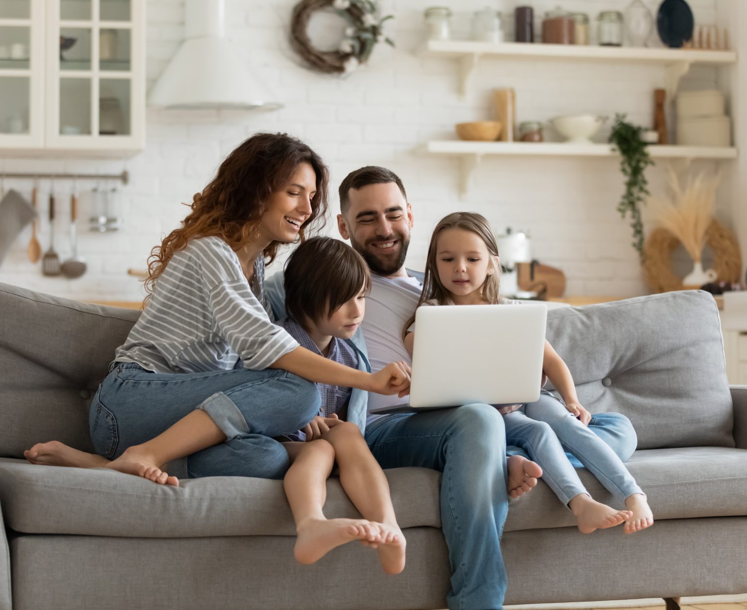 family around the laptop