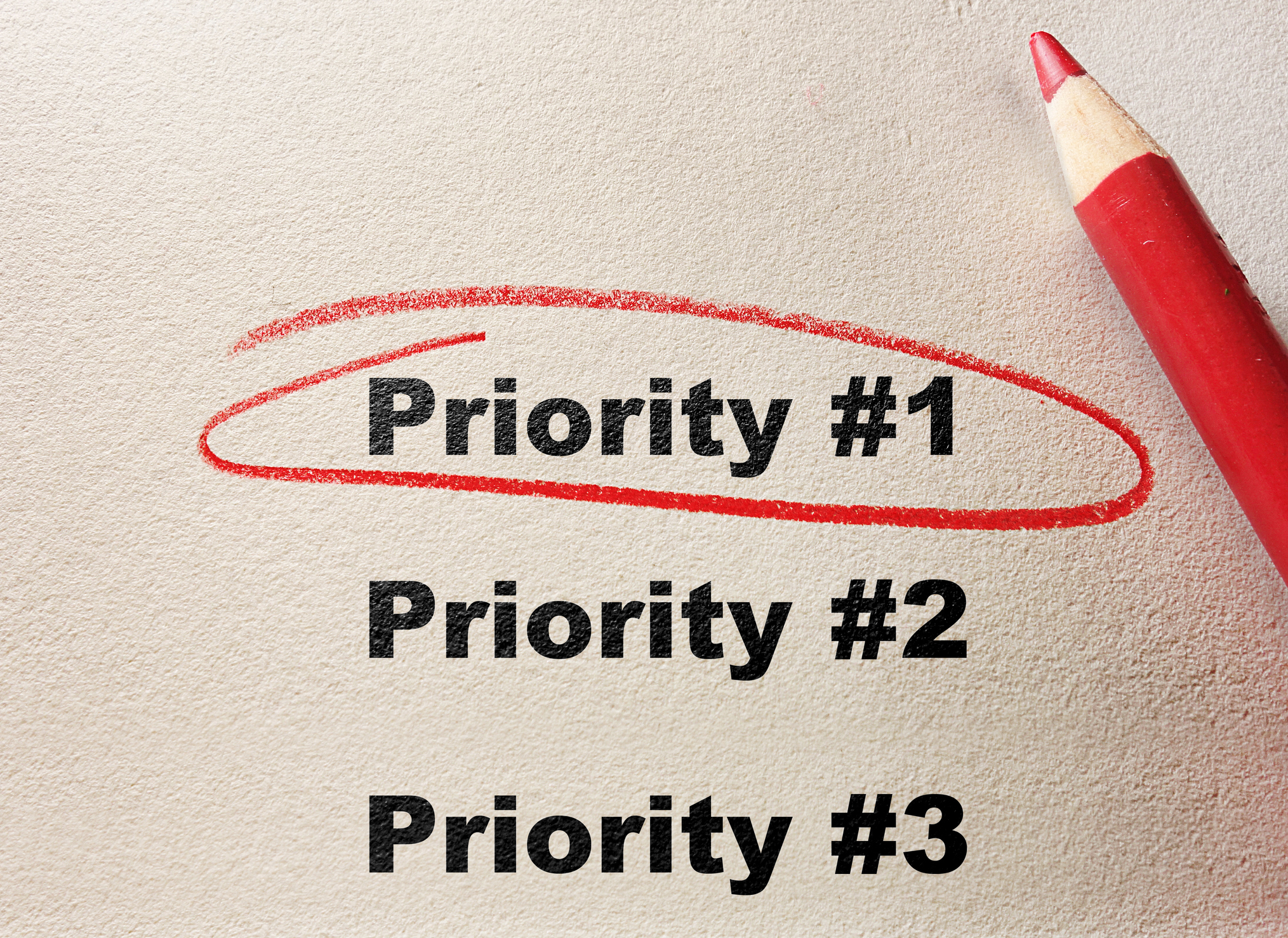 Priority #1-3 on paper with priority #1 circled with red pencil